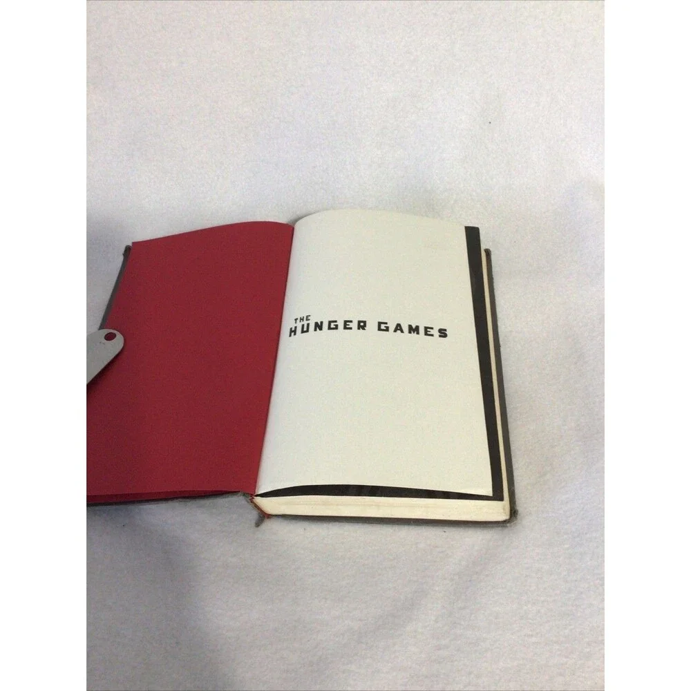 Scholastic The Hunger Games Suzanne Collins First Edition Hardcover‎ Grey Good